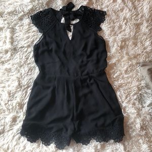Women’s black express romper
